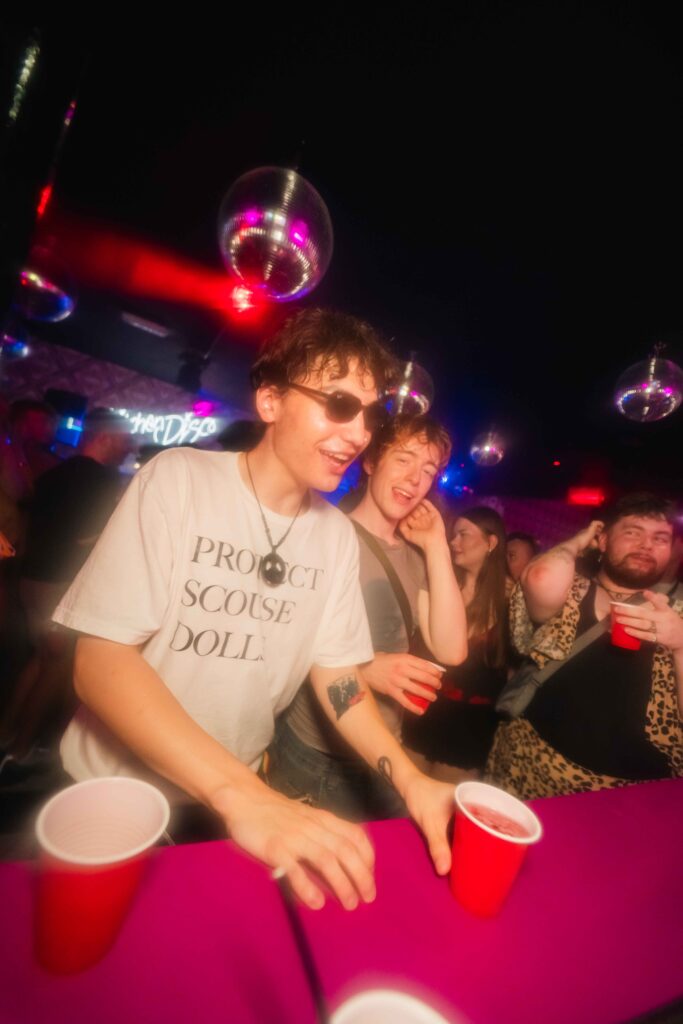 Guest playing a party game at Campus Liverpool